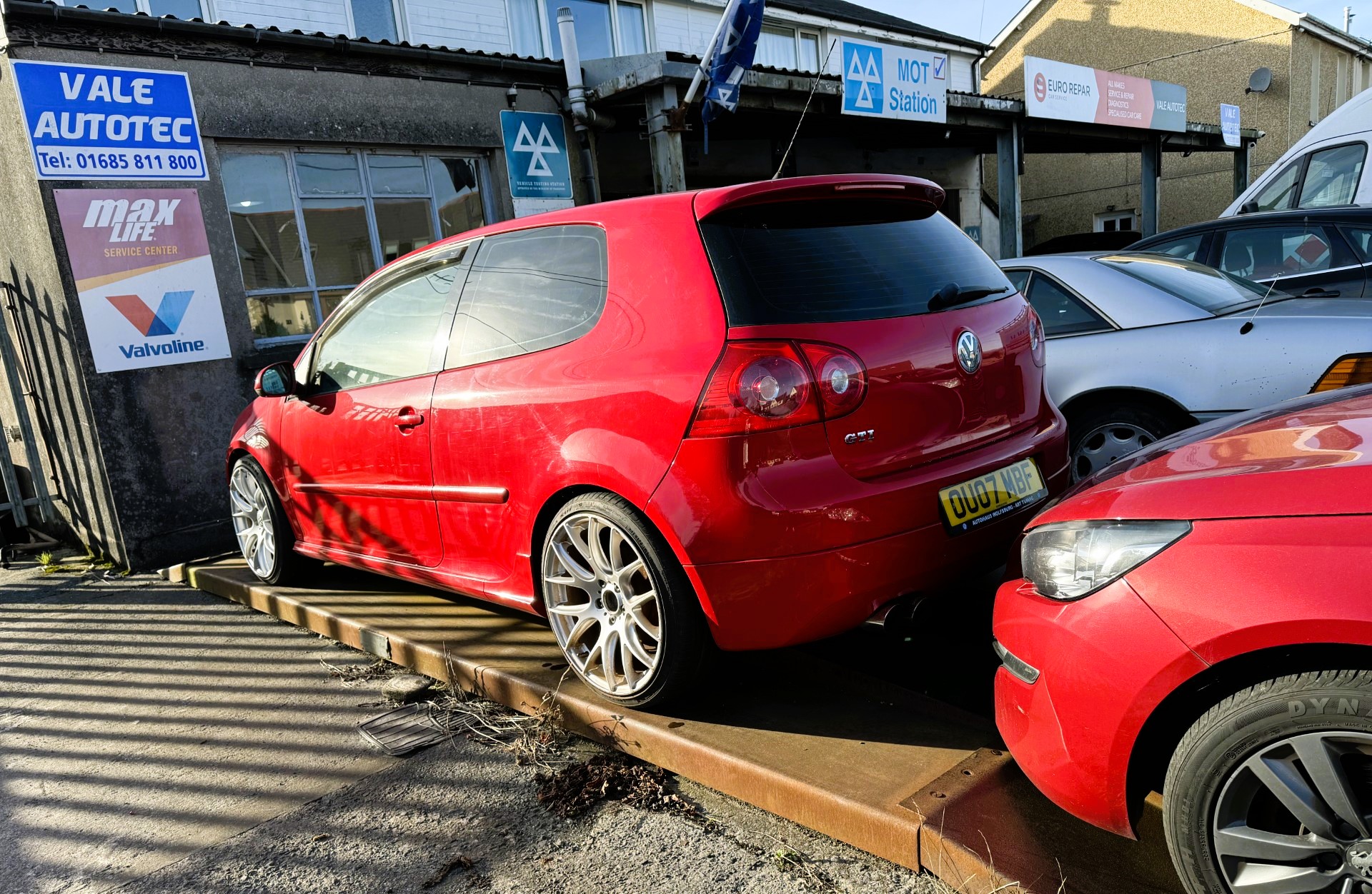 Inside Vale AutoTec's vehicle service bay in South Wales